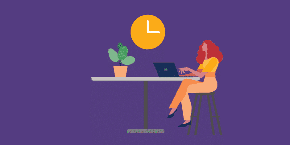 female social media manager working on her laptop with a clock in the background